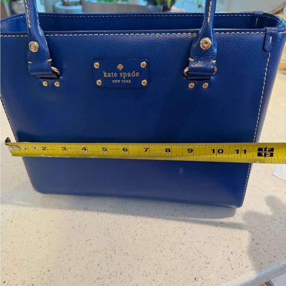 kate spade cobalt blue Wellesley Quinn tote bag featuring gold-toned hardware. - Picture 8 of 14